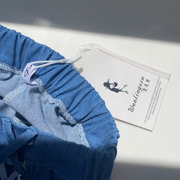 Blue shorts with lace bottom and adjustable ties - Picture 6 of 6